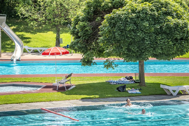 Swimming pool with spacious sunbathing area in Örglwirt's holiday world