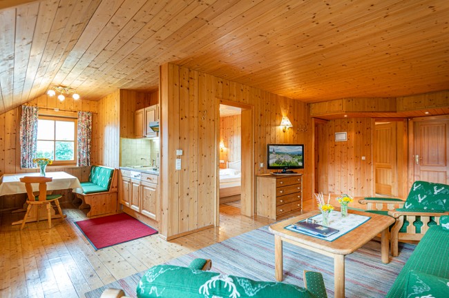 Living room with sitting area and television