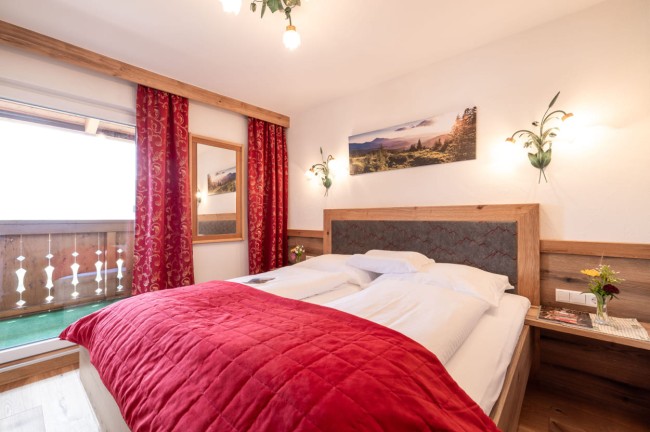 Schlafzimmer mit Balkon
